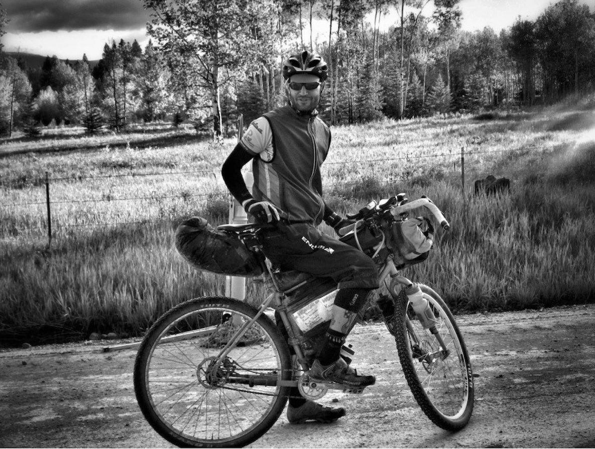 Erik on the Tour Divide. Photo by Adam Guske.